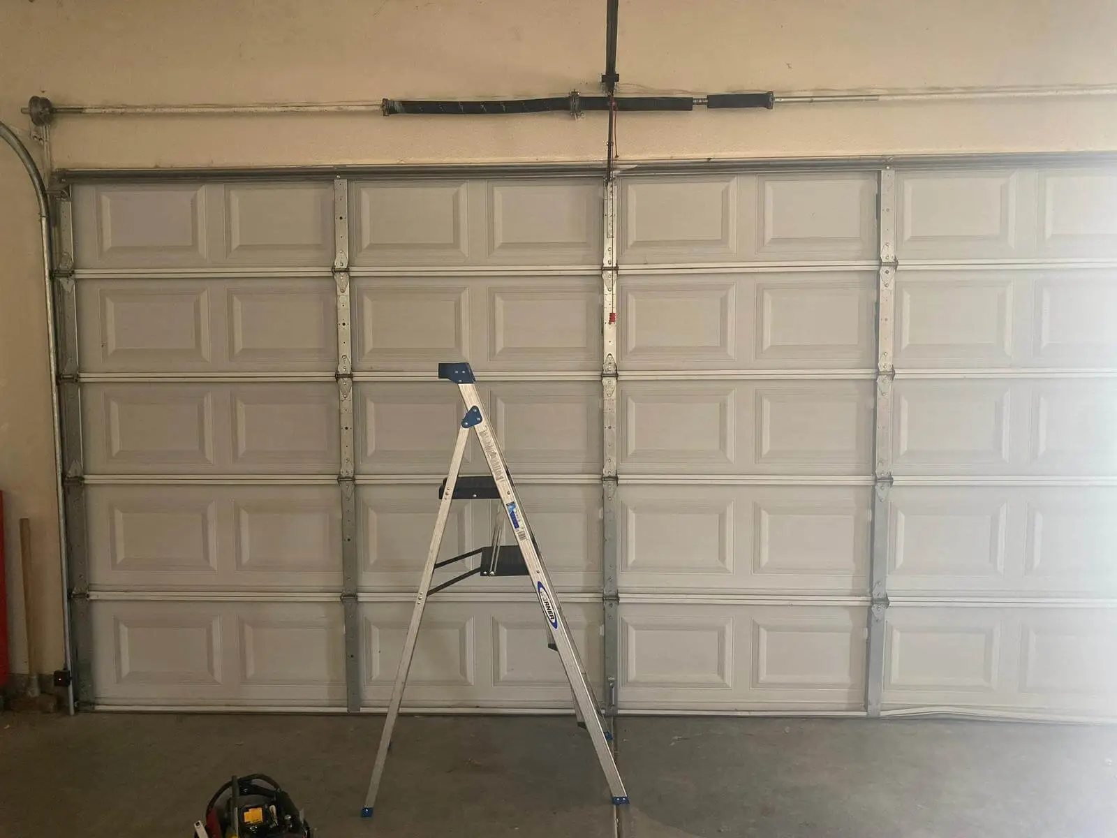 Hiring-Garage-Door-Spring-Repair